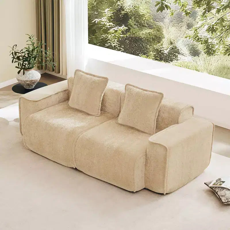 Divano sezionale modulare moderno Okak con seduta profonda e cuscini, divano futon in tessuto di velluto per soggiorno, appartamenti