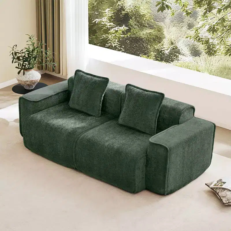 Divano sezionale modulare moderno Okak con seduta profonda e cuscini, divano futon in tessuto di velluto per soggiorno, appartamenti