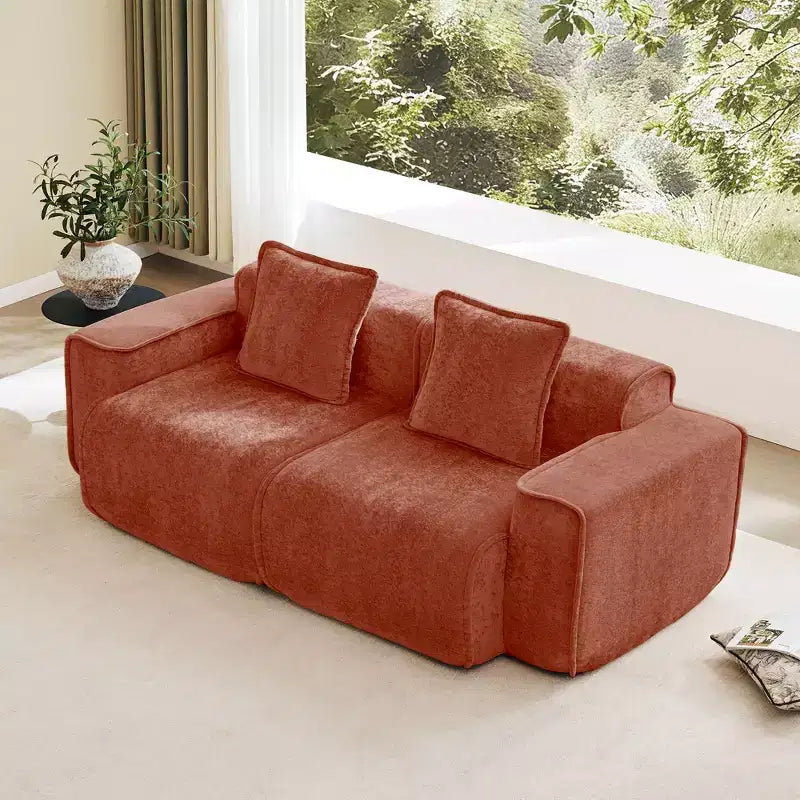 Divano sezionale modulare moderno Okak con seduta profonda e cuscini, divano futon in tessuto di velluto per soggiorno, appartamenti