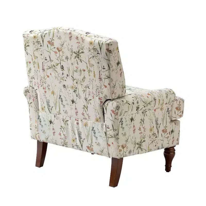 Poltrona da salotto comoda Dani con gambe in legno massello | KARAT HOME