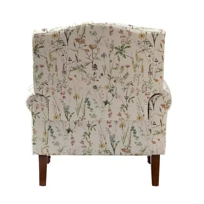 Poltrona da salotto comoda Dani con gambe in legno massello | KARAT HOME