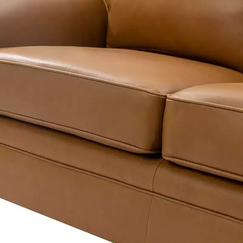 Divanetto Chesterfield Antonia largo 152 cm in vera pelle con finiture borchiate e braccioli arrotolati