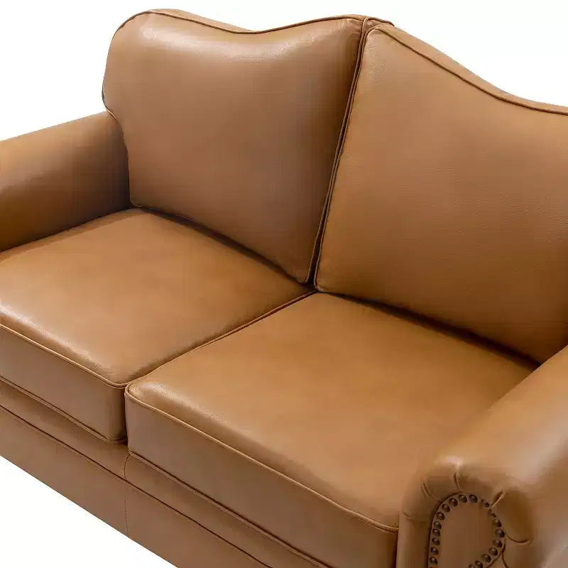Divanetto Chesterfield Antonia largo 152 cm in vera pelle con finiture borchiate e braccioli arrotolati
