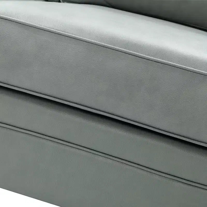 Divanetto Chesterfield Antonia largo 152 cm in vera pelle con finiture borchiate e braccioli arrotolati