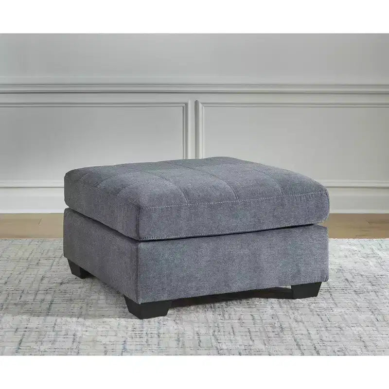 Pouf accentato contemporaneo oversize quadrato Marleton di Signature Design by Ashley con imbottitura rigida e finitura in finto legno a vista, blu denim